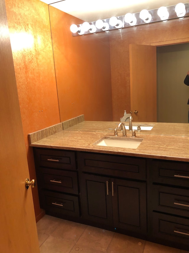 bathroom with vanity and tile patterned floors