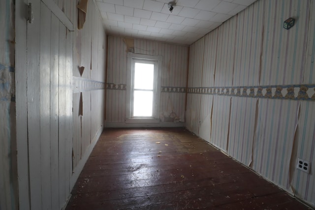 unfurnished room featuring wood-type flooring