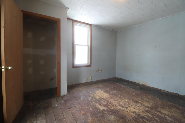 empty room featuring hardwood / wood-style floors