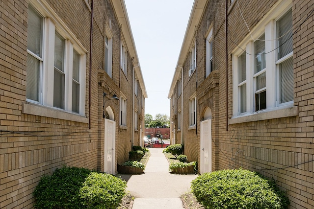 view of home's exterior with brick siding