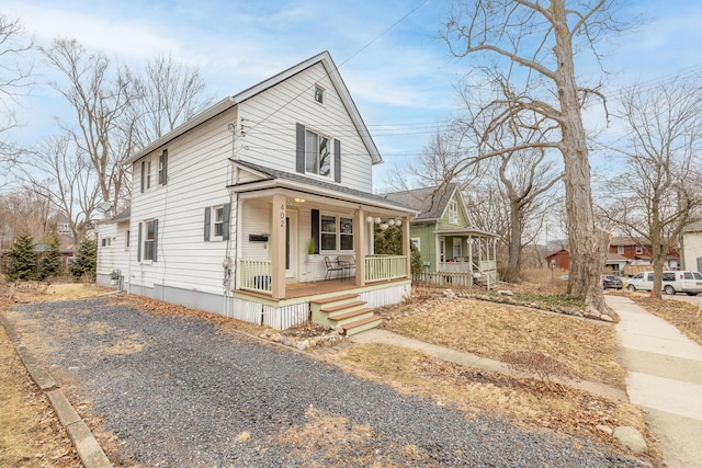 view of front of home with covered porch and driveway