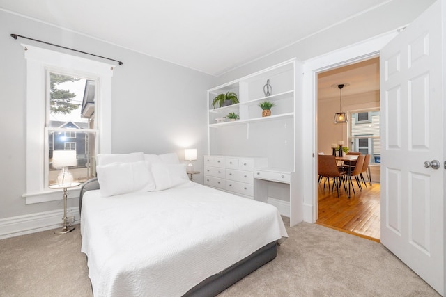 bedroom with light carpet