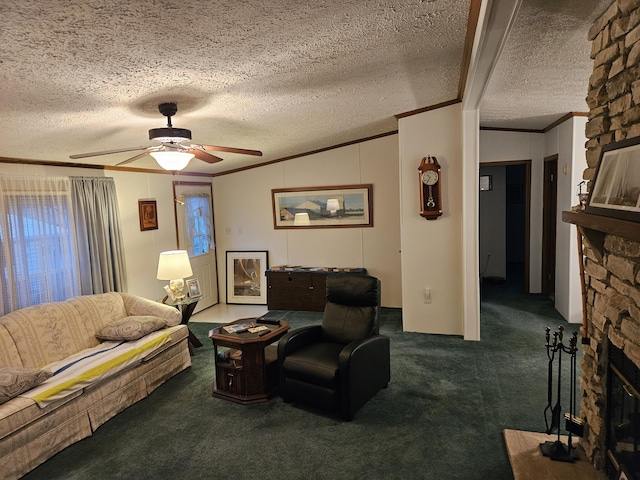 living area featuring carpet, crown molding, ceiling fan, a stone fireplace, and a textured ceiling