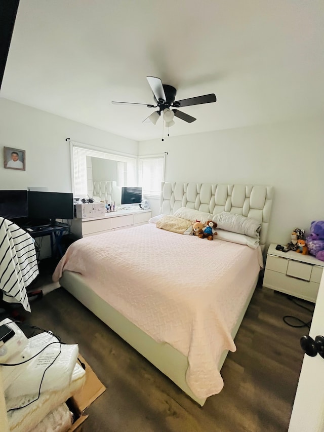 4539 Trumbull Dr, Flint, MI 48504 - bedroom with ceiling fan and dark wood finished floors