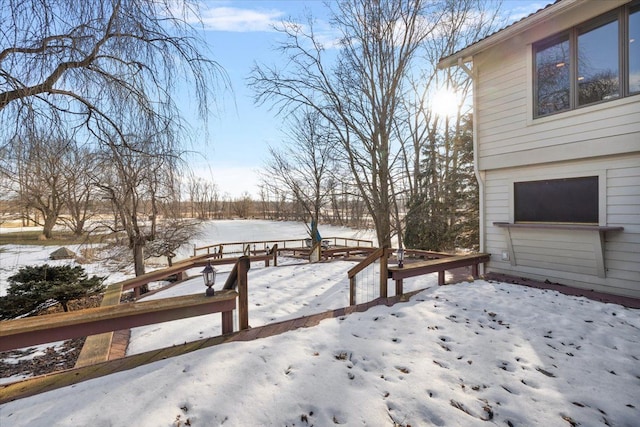 view of snow covered deck