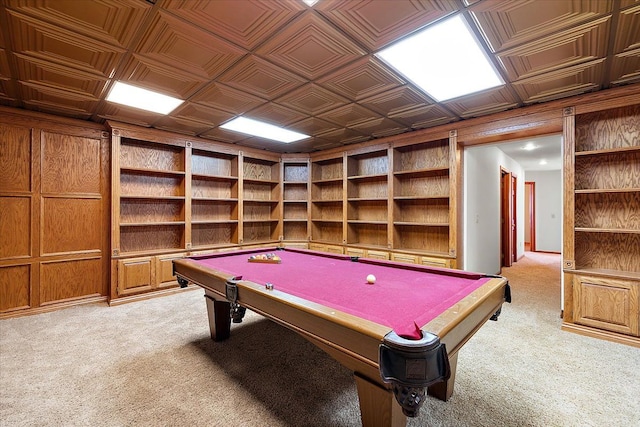 recreation room with wooden walls, light carpet, pool table, built in features, and an ornate ceiling