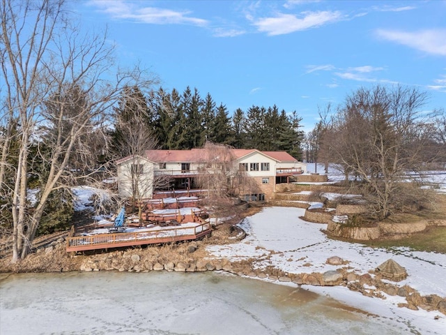 view of front of house with a wooden deck