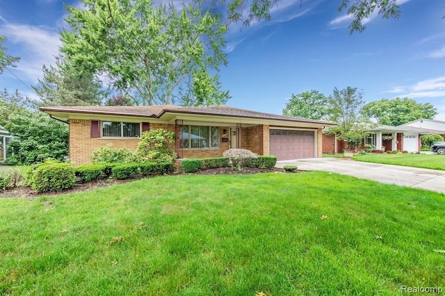 ranch-style house with a garage, concrete driveway, brick siding, and a front lawn