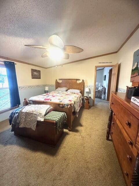 carpeted bedroom with ceiling fan, ornamental molding, and a textured ceiling