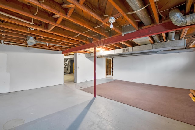 unfinished basement with visible vents