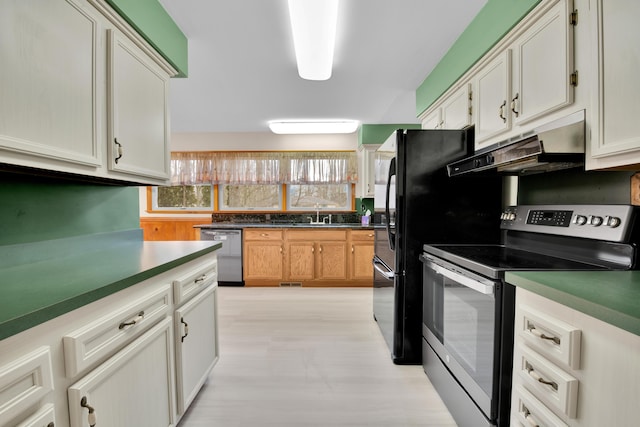 kitchen with appliances with stainless steel finishes, visible vents, and under cabinet range hood