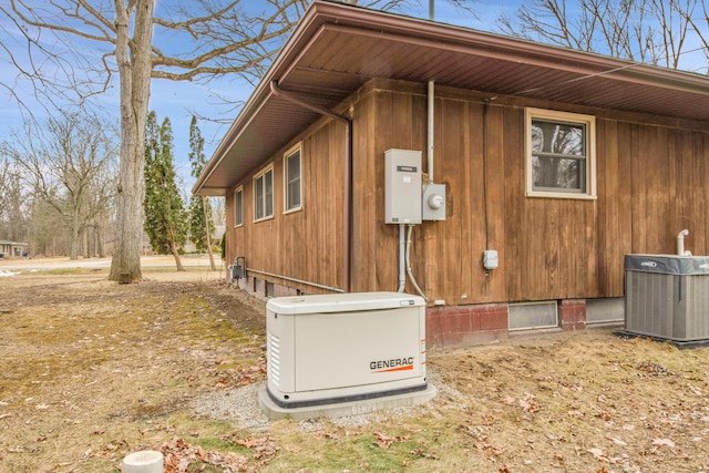 view of home's exterior featuring central AC unit