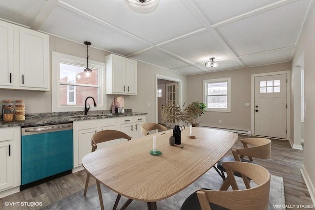 kitchen featuring coffered ceiling, dishwasher, dark wood-style floors, a baseboard radiator, and a sink