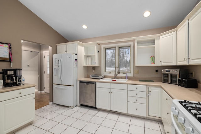 kitchen with light tile patterned floors, open shelves, vaulted ceiling, a sink, and white appliances