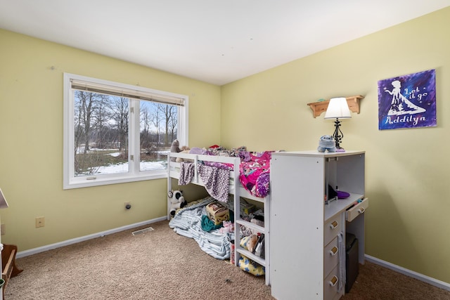 bedroom with carpet flooring, visible vents, and baseboards