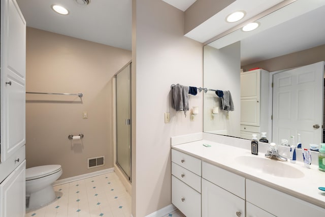 bathroom featuring a stall shower, visible vents, vanity, and toilet