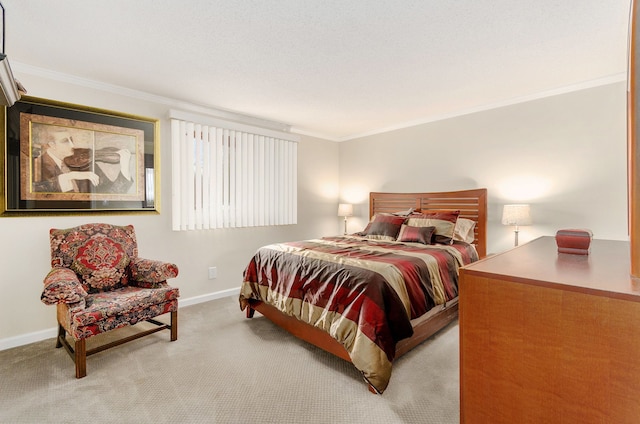 carpeted bedroom featuring baseboards and ornamental molding