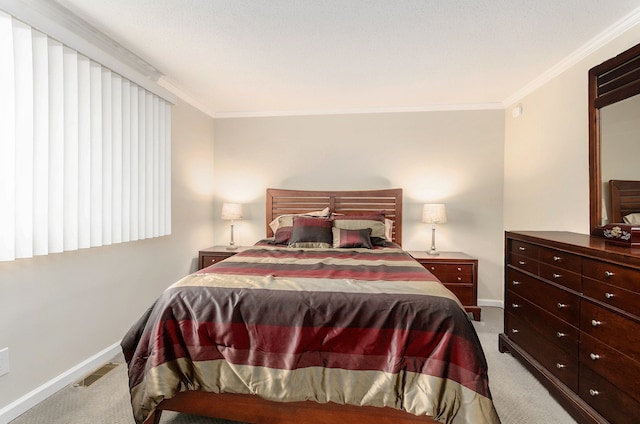 bedroom with crown molding, visible vents, baseboards, and light carpet