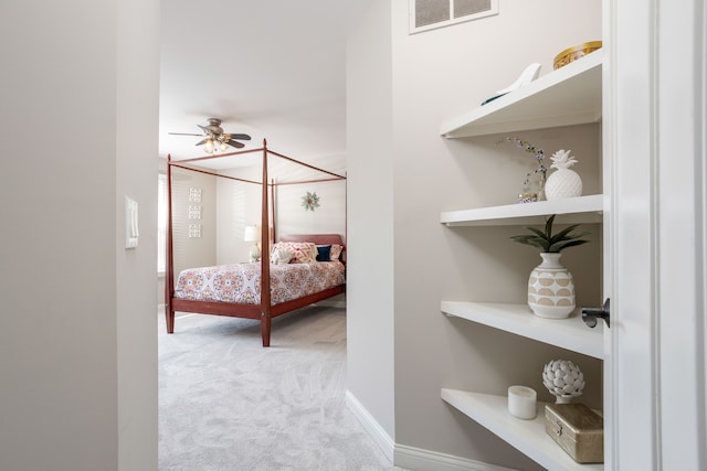 bedroom with visible vents, baseboards, and carpet