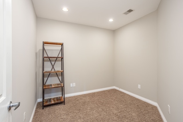 carpeted empty room with recessed lighting, baseboards, and visible vents