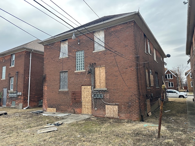 view of home's exterior featuring brick siding