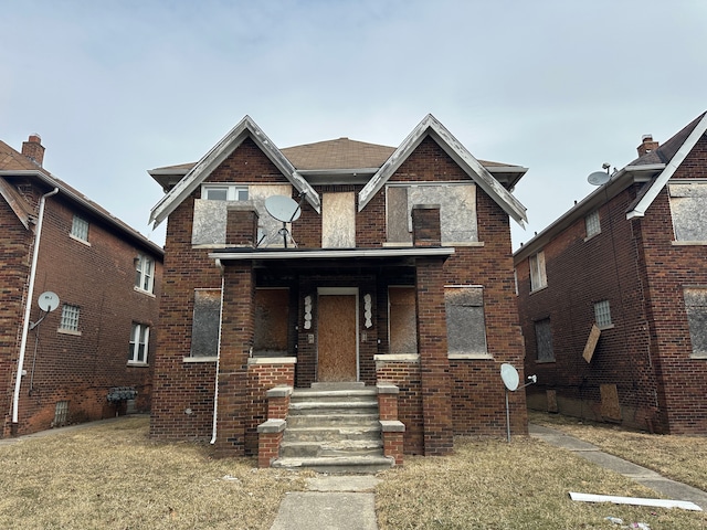 view of front of property with brick siding