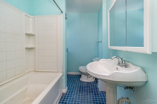 bathroom featuring toilet, baseboards, shower / bathing tub combination, and tile patterned floors