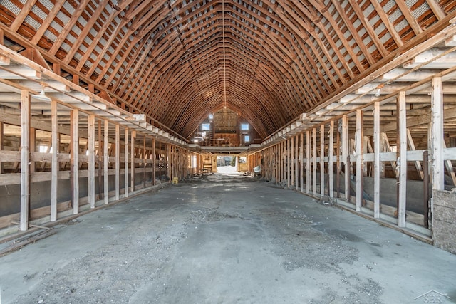miscellaneous room featuring lofted ceiling