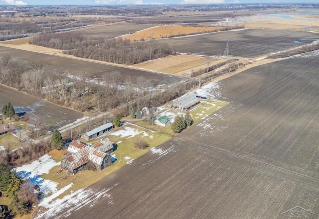 birds eye view of property featuring a rural view
