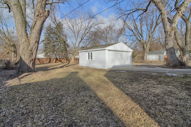 detached garage with fence