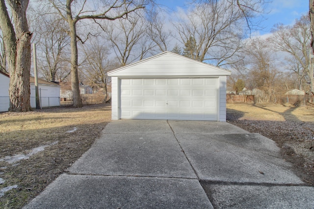 detached garage with fence