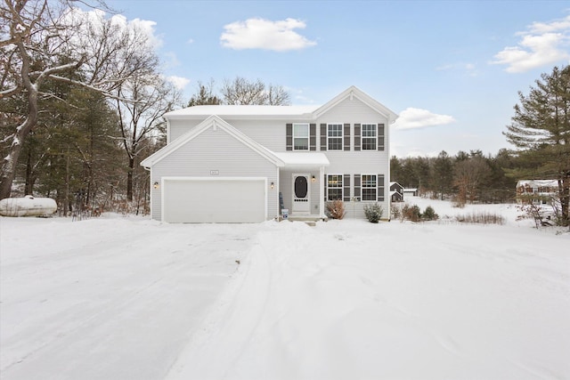 traditional-style home featuring a garage