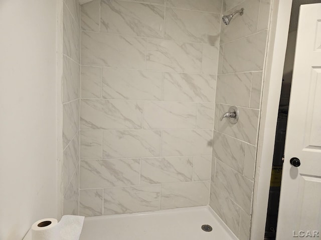 bathroom with a stall shower