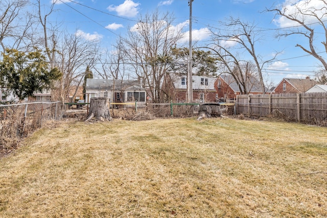 view of yard featuring a fenced backyard