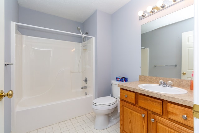 bathroom with tile patterned floors, toilet, a textured ceiling, bathtub / shower combination, and vanity