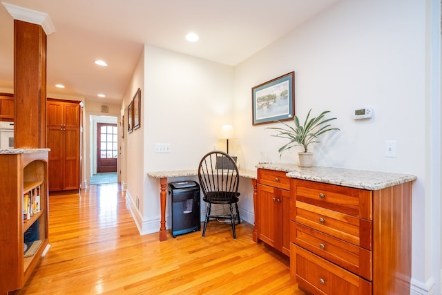 interior space featuring light wood-style flooring, baseboards, and recessed lighting