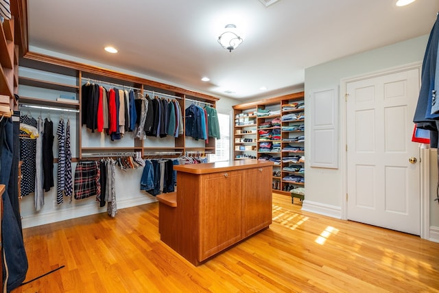 spacious closet with light wood-style flooring