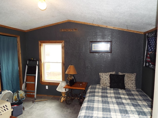 bedroom featuring lofted ceiling and a textured ceiling