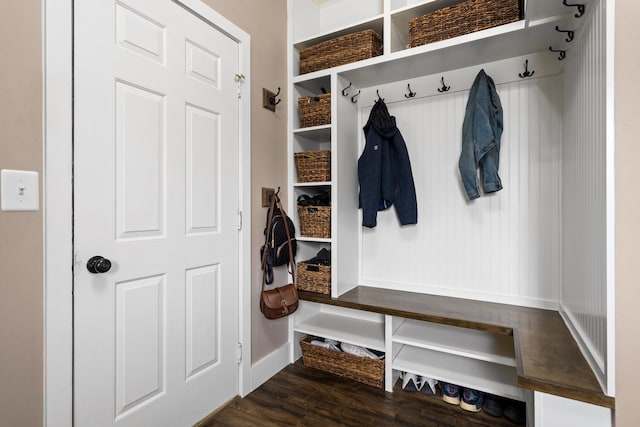 mudroom with baseboards and dark wood-style floors