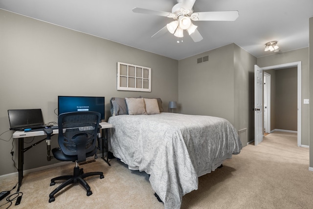 bedroom featuring visible vents, carpet flooring, baseboards, and a ceiling fan