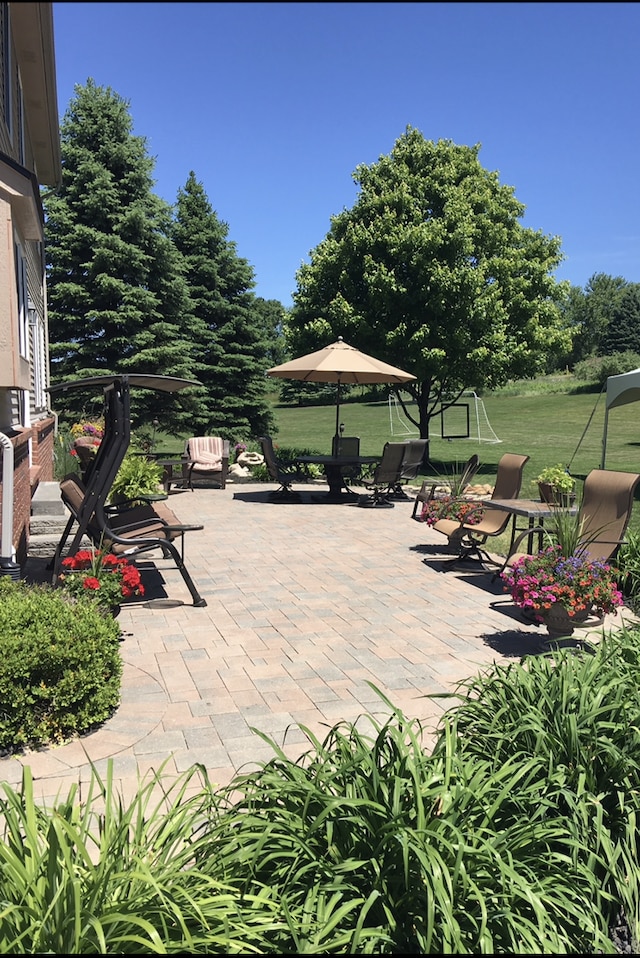 view of patio with outdoor dining area