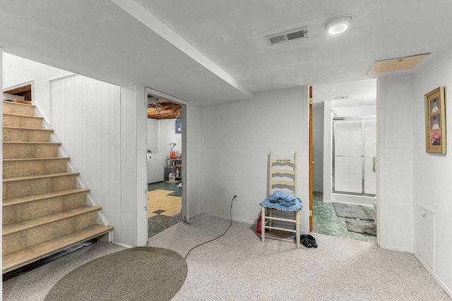 interior space featuring stairs, carpet flooring, and visible vents