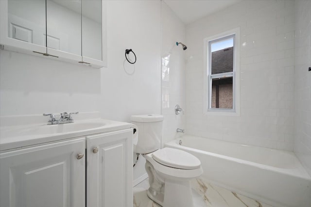 bathroom featuring toilet, tub / shower combination, and vanity