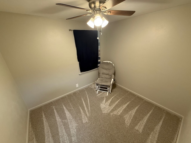 interior space featuring ceiling fan, carpet flooring, and baseboards