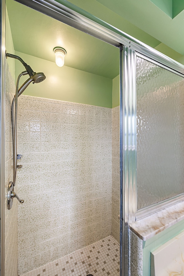 bathroom with a stall shower