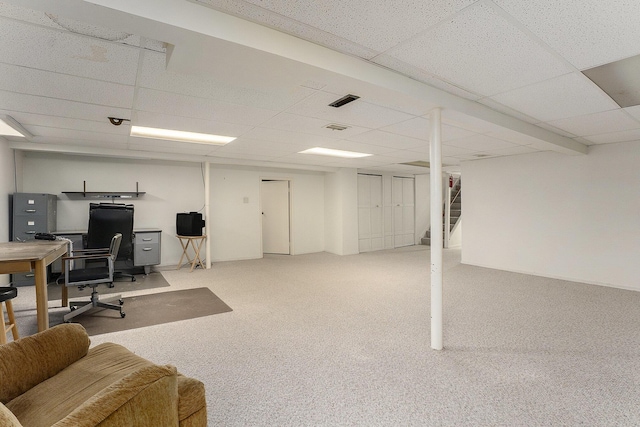 office featuring a drop ceiling and carpet flooring