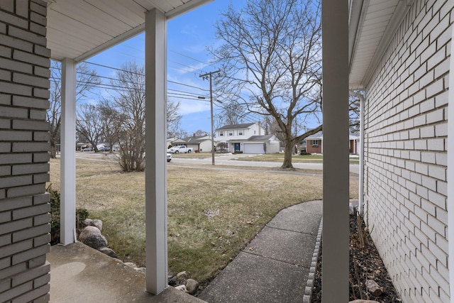 view of yard featuring a residential view