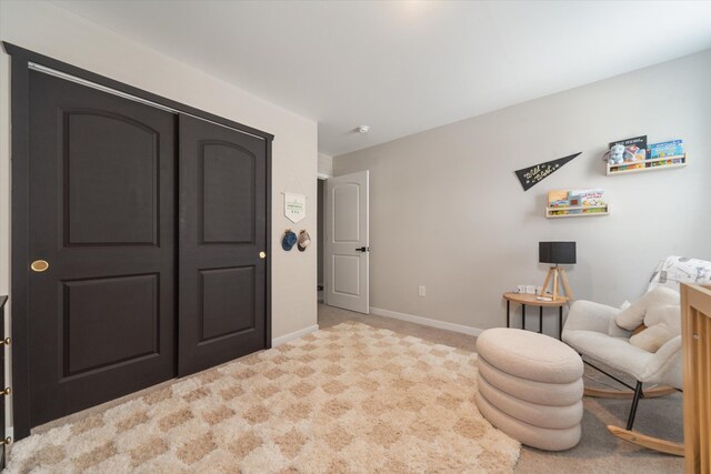 135 Barnsley Dr, Howell, MI 48843 - living area with carpet floors and baseboards