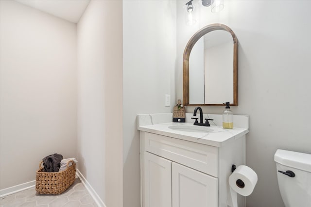 135 Barnsley Dr, Howell, MI 48843 - half bathroom with baseboards, vanity, and toilet