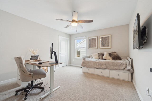 135 Barnsley Dr, Howell, MI 48843 - bedroom featuring light carpet, ceiling fan, and baseboards